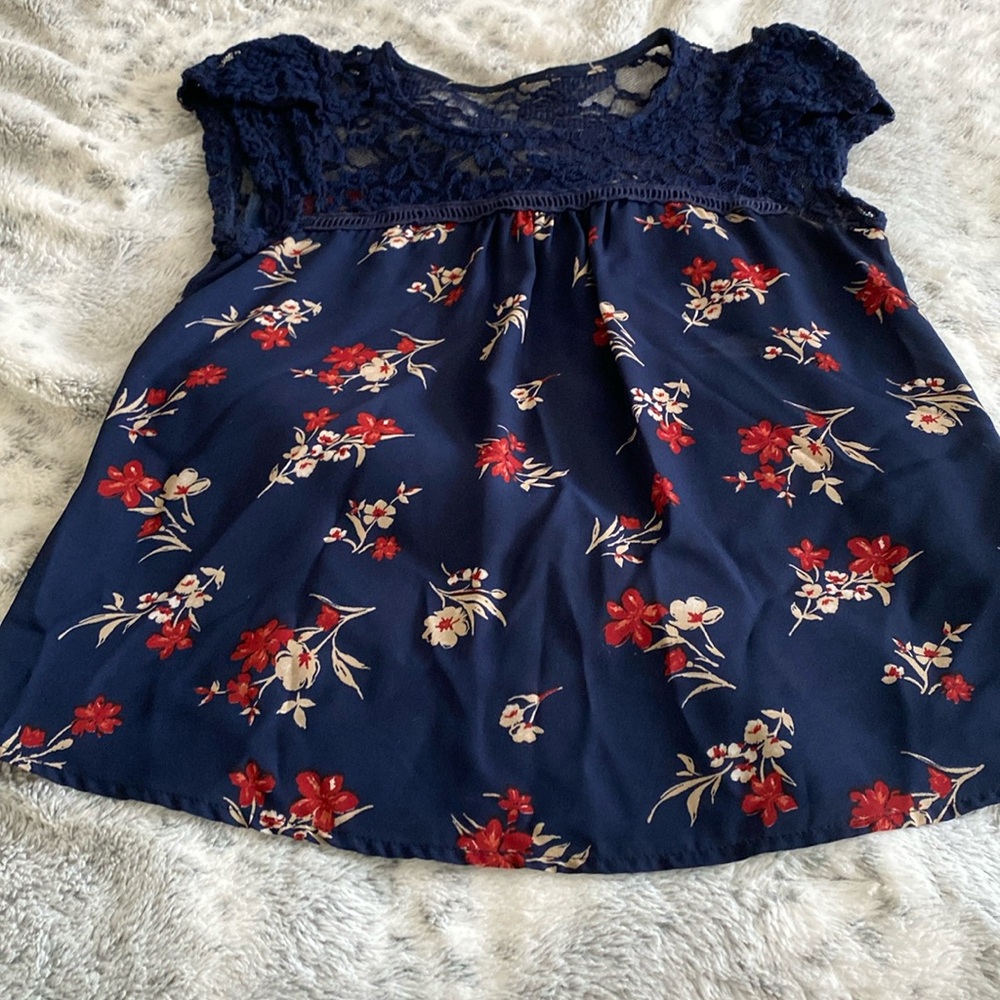 Cute blue top with floral pattern